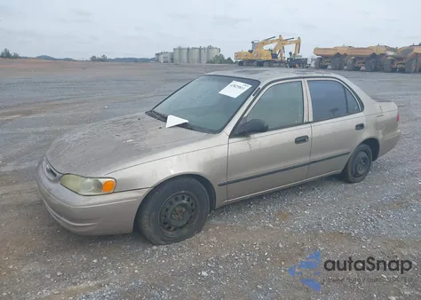 1999 Toyota Corolla Ce z USA, uszkodzony, nr VIN 2T1BR12E3XC221038